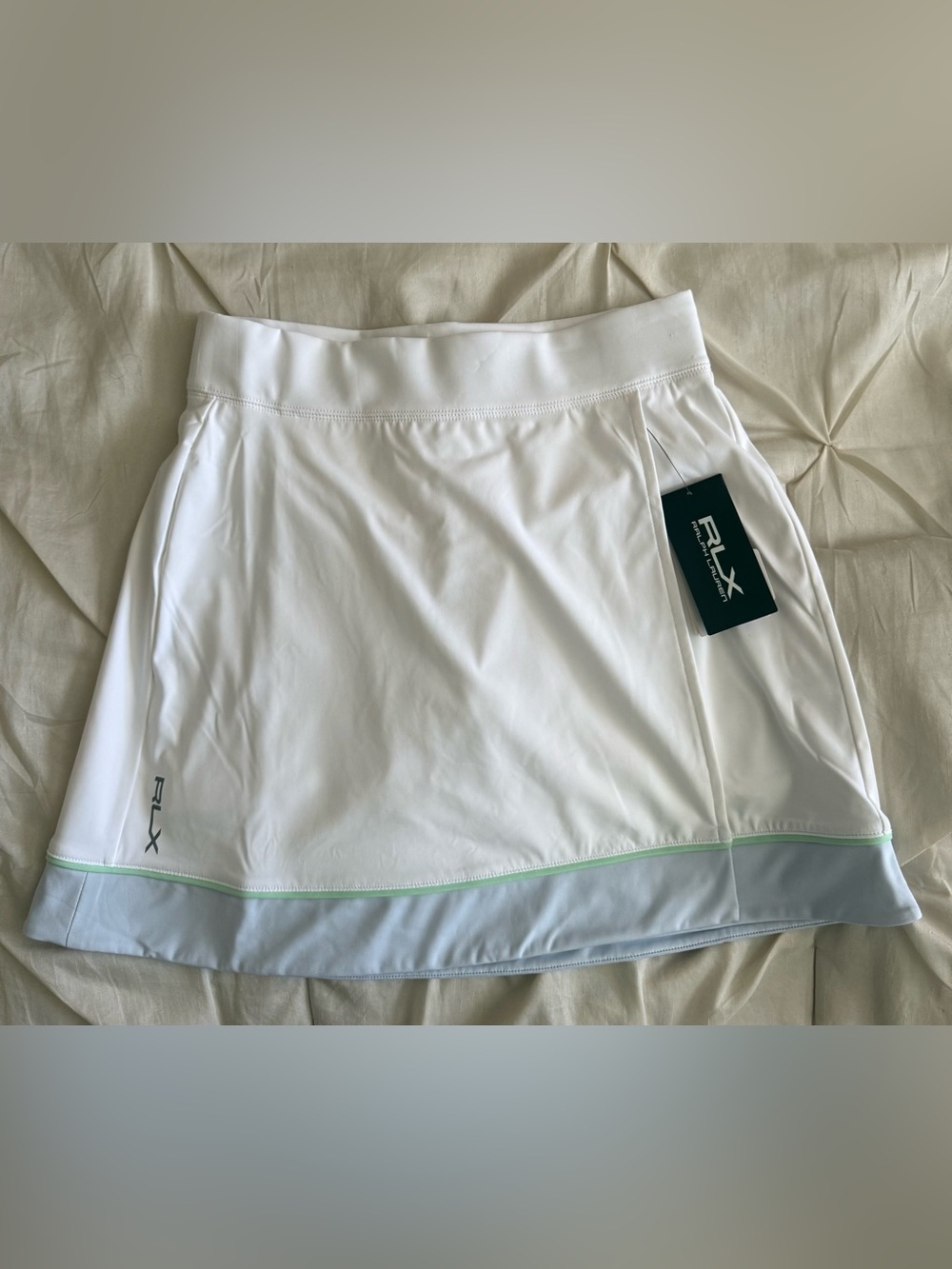 RLX White Athletic Skirt with Light Blue Hem